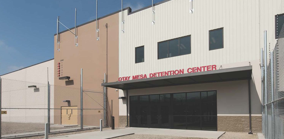 This image has an empty alt attribute; its file name is Otay-Mesa-Detention-Entranc.jpg